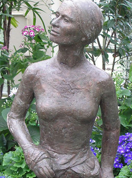Statue of Mary Gilbert, one of the first settlers, in the Fitzroy Gardens conservatory.